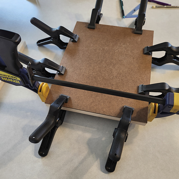 backing board and sides of cradle are glued and clamped