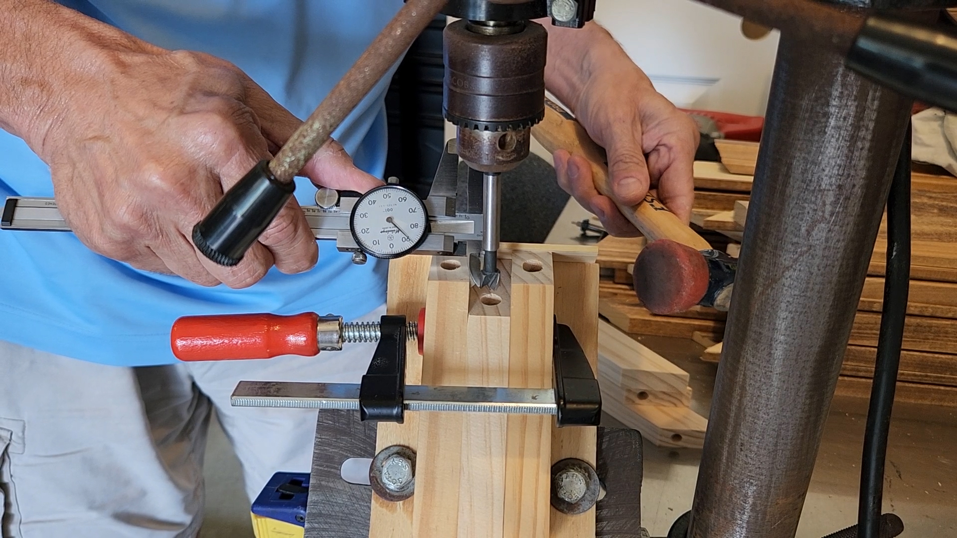 Drilling the ends of the cradle side pieces for pegs